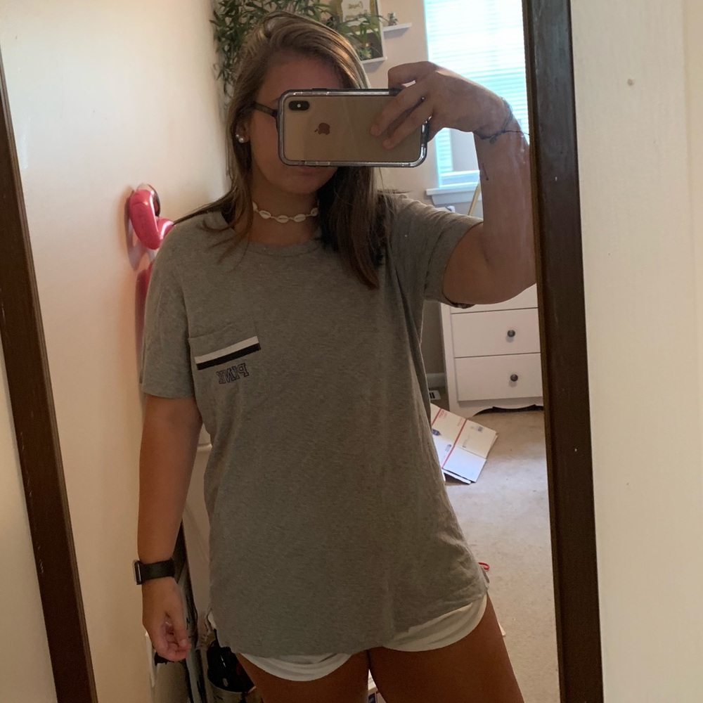 grey shirt from pink